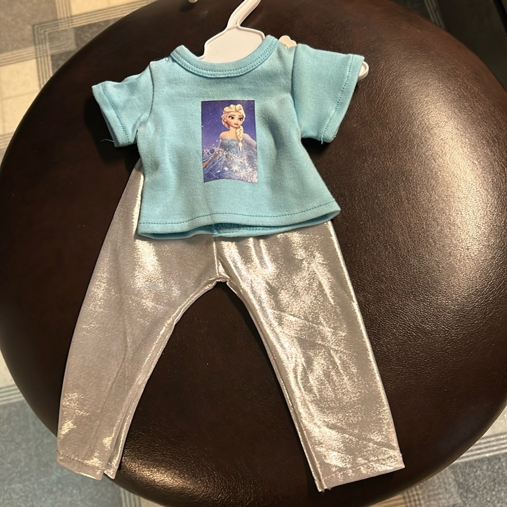 Frozen Elsa shirt and shiny pants these are  new never played with